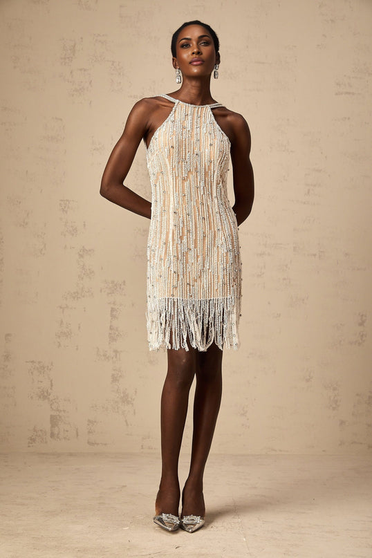 A short Giulietta mini dress with shimmering embellishments and fringe details along the hemline