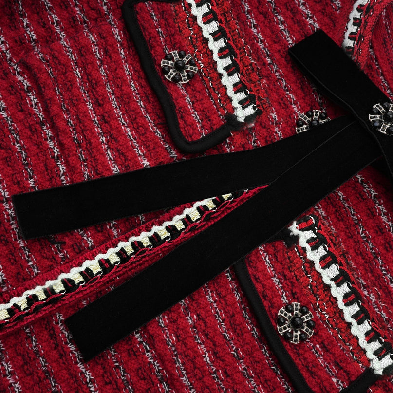 A short knit mini dress with a bow detail named Faustine