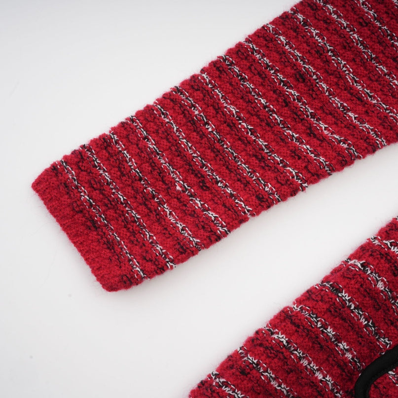 A short knit mini dress with a bow detail named Faustine