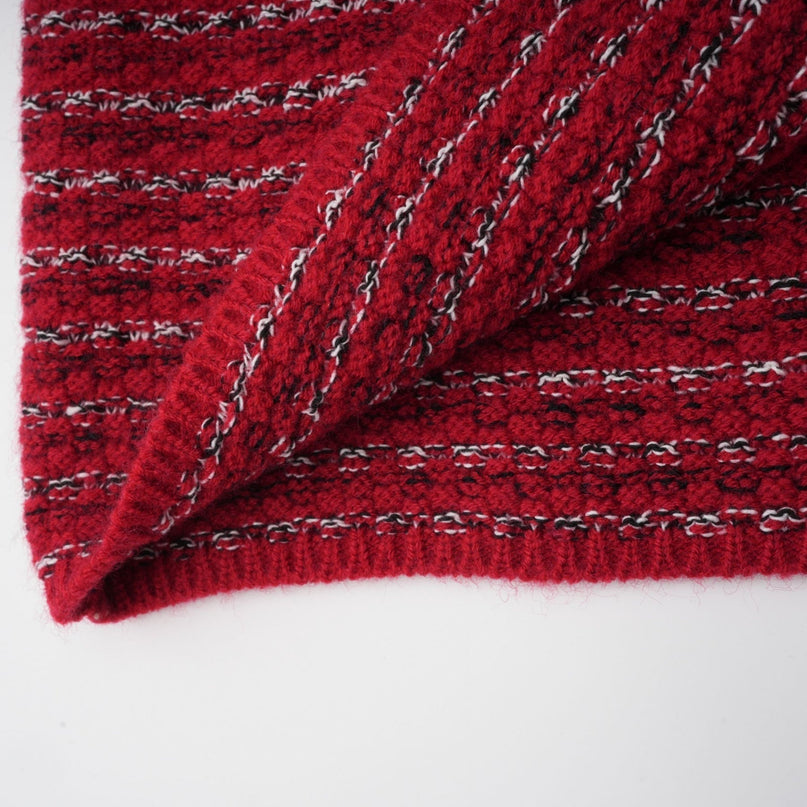 A short knit mini dress with a bow detail named Faustine