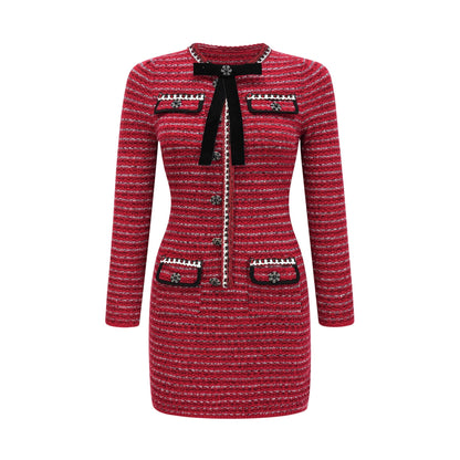 A short knit mini dress with a bow detail named Faustine