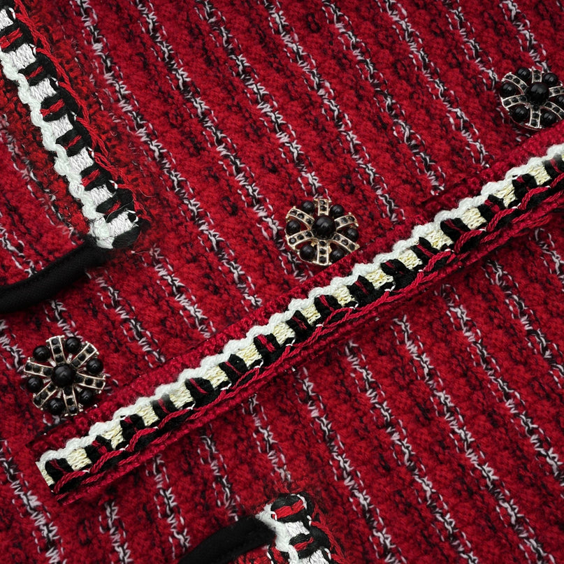 A short knit mini dress with a bow detail named Faustine