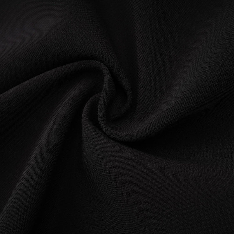 A short mini dress with contrasting colors and embellishments named Esmee