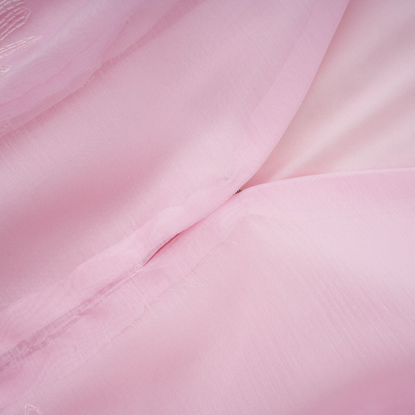 A short pink dress with floral embroidery and a layered skirt design named Florence