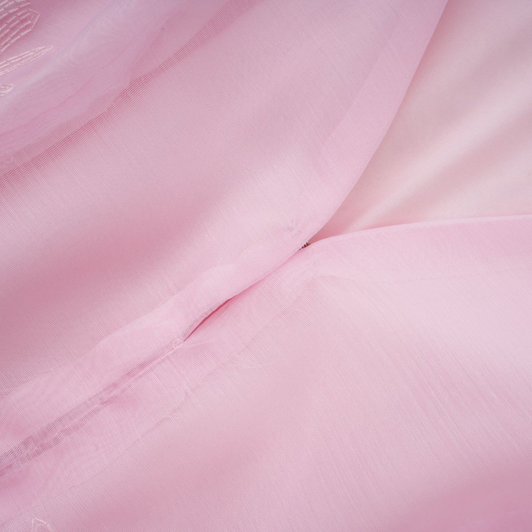 A short pink dress with floral embroidery and a layered skirt design named Florence