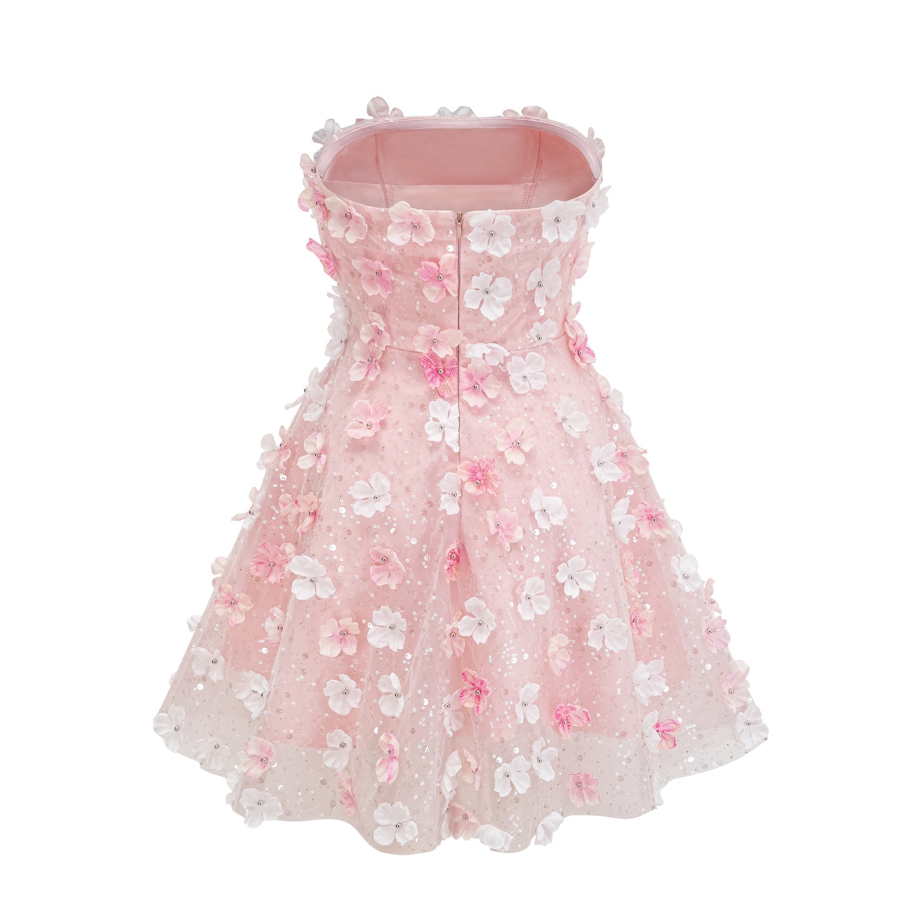 A short pink mini dress with puffy threedimensional petal details covering the bodice and skirt creating a floral textured appearance