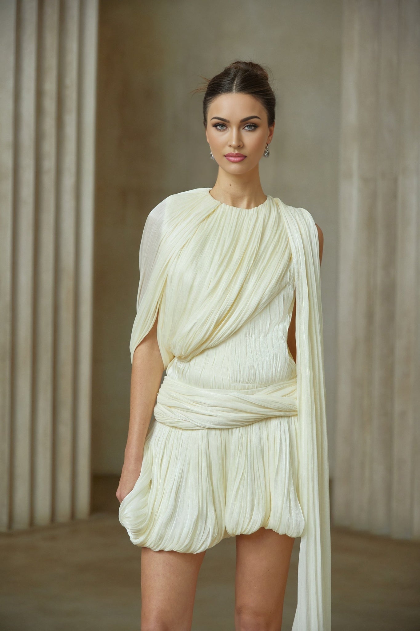 A short pleated mini dress with a ribbon design accent named Cyrielle