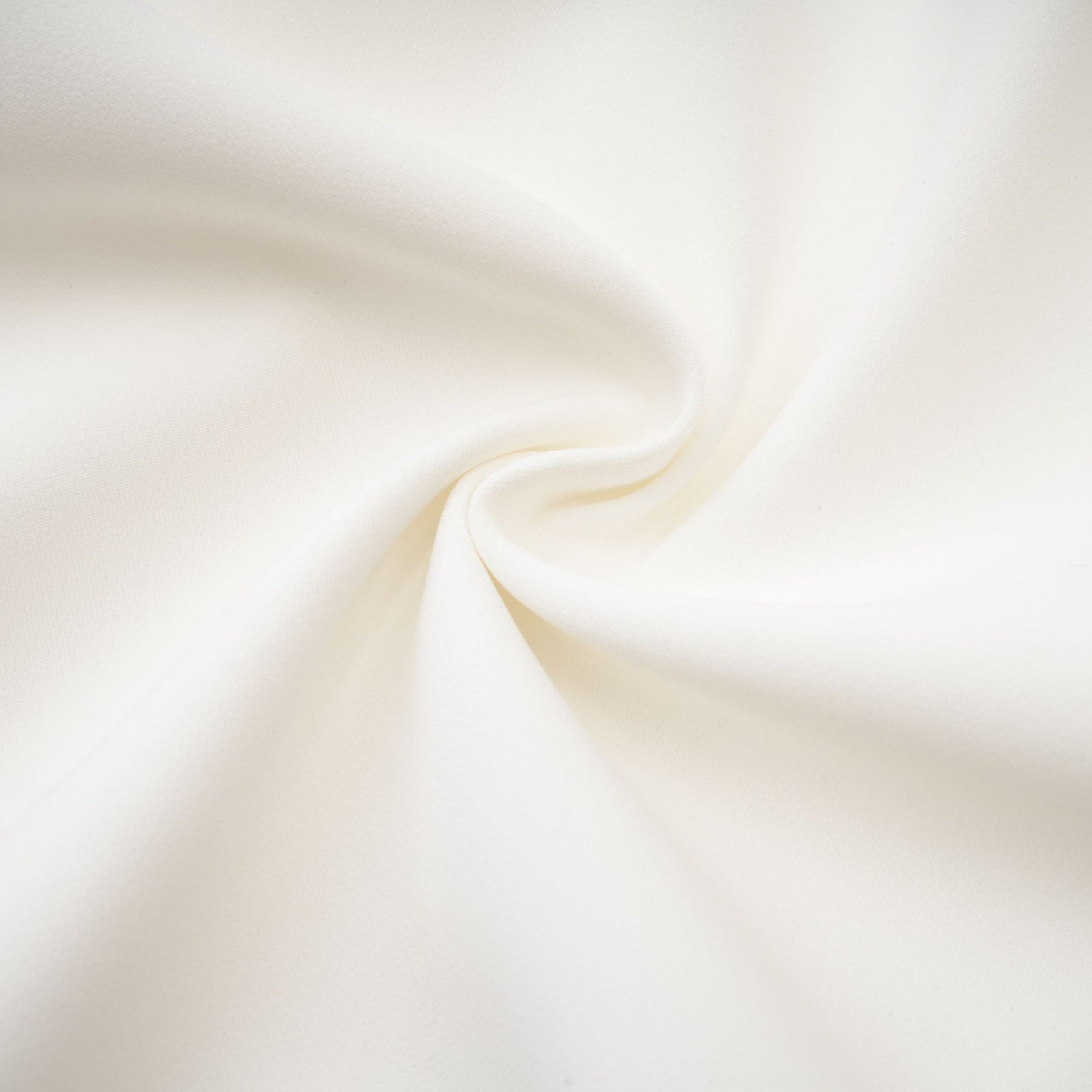 A short white mini dress with embellishments and detailing likely featuring a slim fit and decorative elements on the fabric