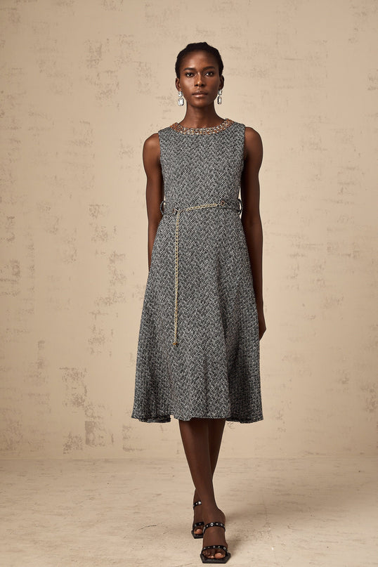A sleeveless grey tweed midi dress with crystal embellishments suitable for Valentines Day