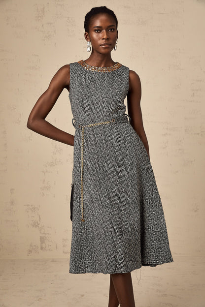 A sleeveless grey tweed midi dress with crystal embellishments suitable for Valentines Day