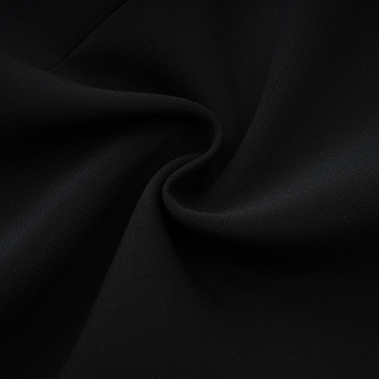 Black sleeveless dress with a cutout design and bowknot embellishment Straight hem thigh length and rear zip fastening Composed of 65% Viscose 35% Polyamide