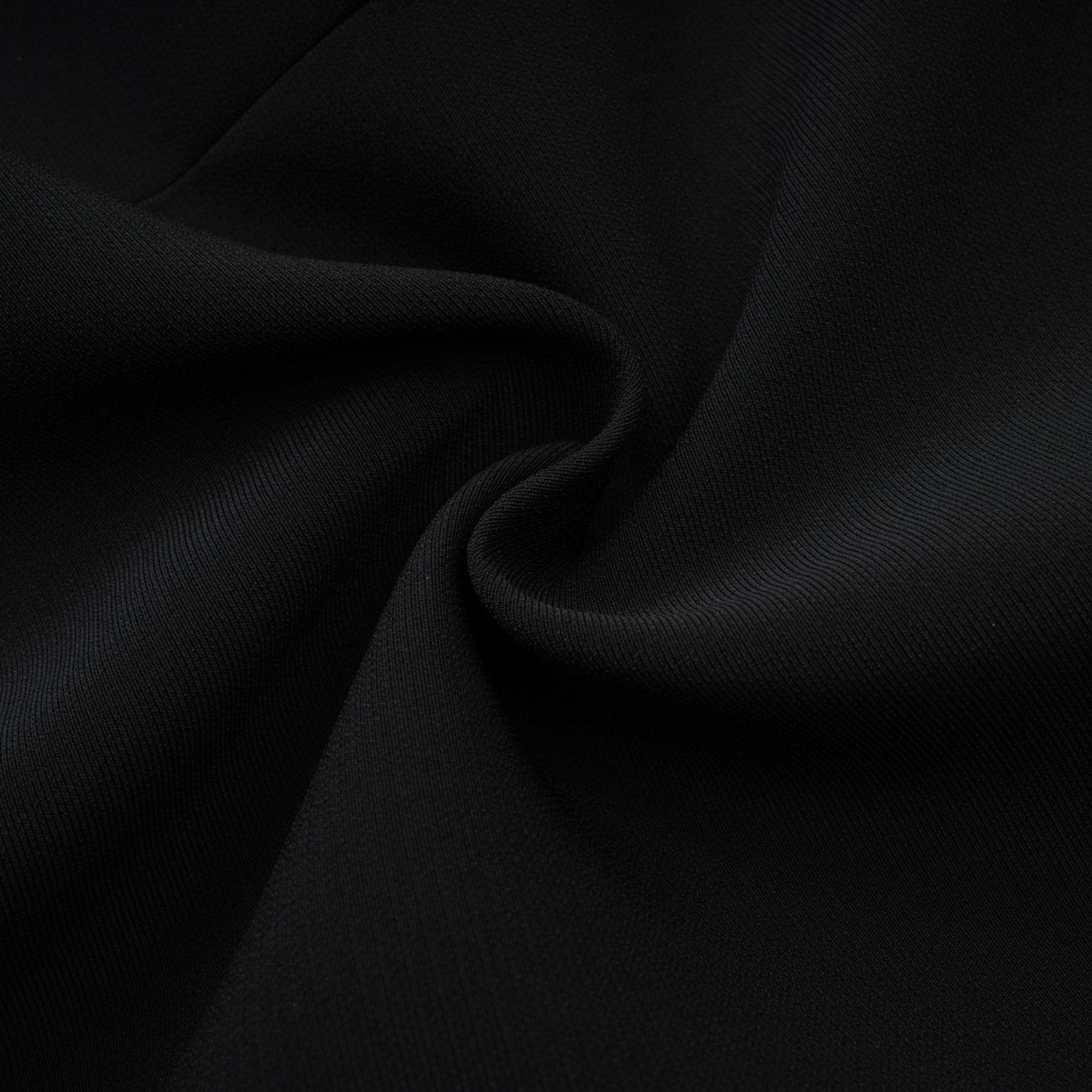 Black sleeveless dress with a cutout design and bowknot embellishment Straight hem thigh length and rear zip fastening Composed of 65% Viscose 35% Polyamide