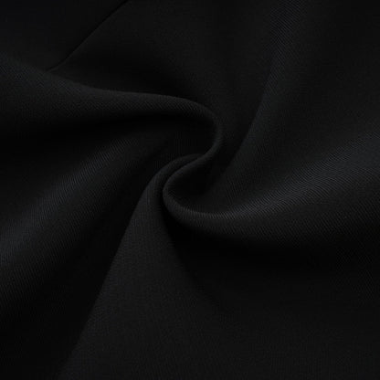 Black sleeveless dress with a cutout design and bowknot embellishment Straight hem thigh length and rear zip fastening Composed of 65% Viscose 35% Polyamide