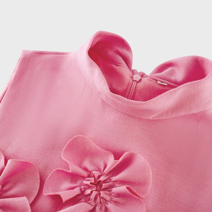 A sleeveless pink maxi dress with a bow and artificial flower decorations named Magali