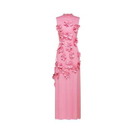 A sleeveless pink maxi dress with a bow and artificial flower embellishment named Magali