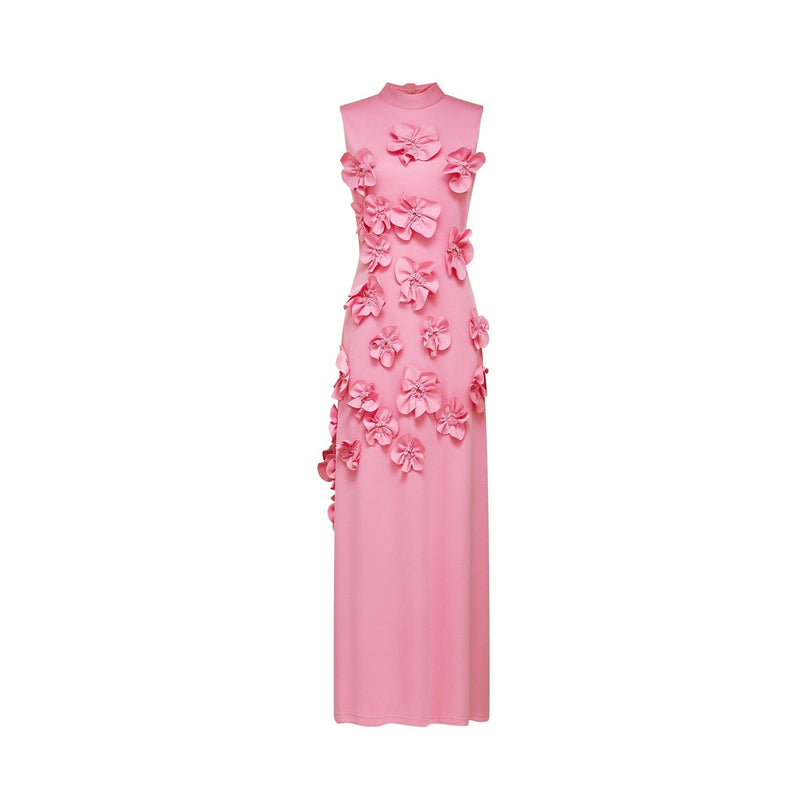 A sleeveless pink maxi dress with a bow and artificial flower embellishment named Magali