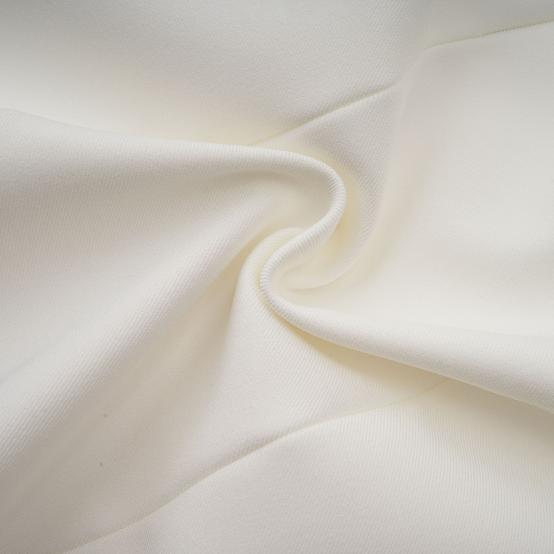 A sleeveless white midi dress featuring three dimensional floral petal details