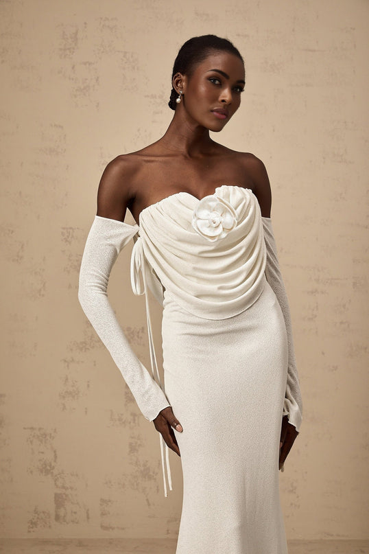 A strapless maxi dress with floral appliques and ruched detailing named Julia