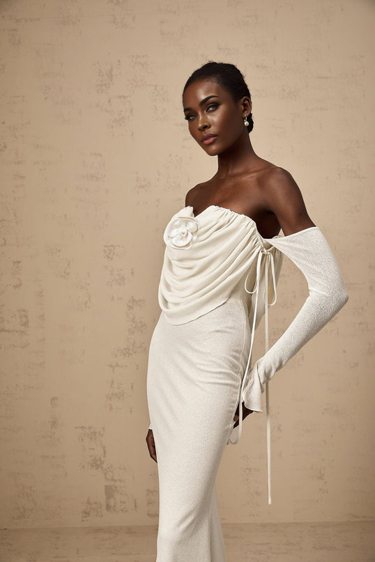 A strapless maxi dress with ruched detailing and floral appliques named Julia