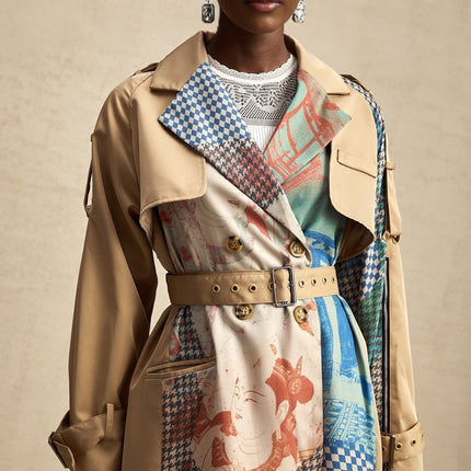 A trench coat with contrasting colors and a printed design featuring a belt at the waist named Josephine