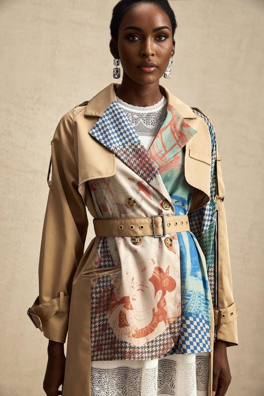 A trench coat with contrasting colors and a printed design featuring a belt at the waist named Josephine