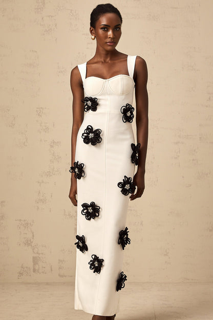 A white floorlength bandage dress with floral applique details named Olivia
