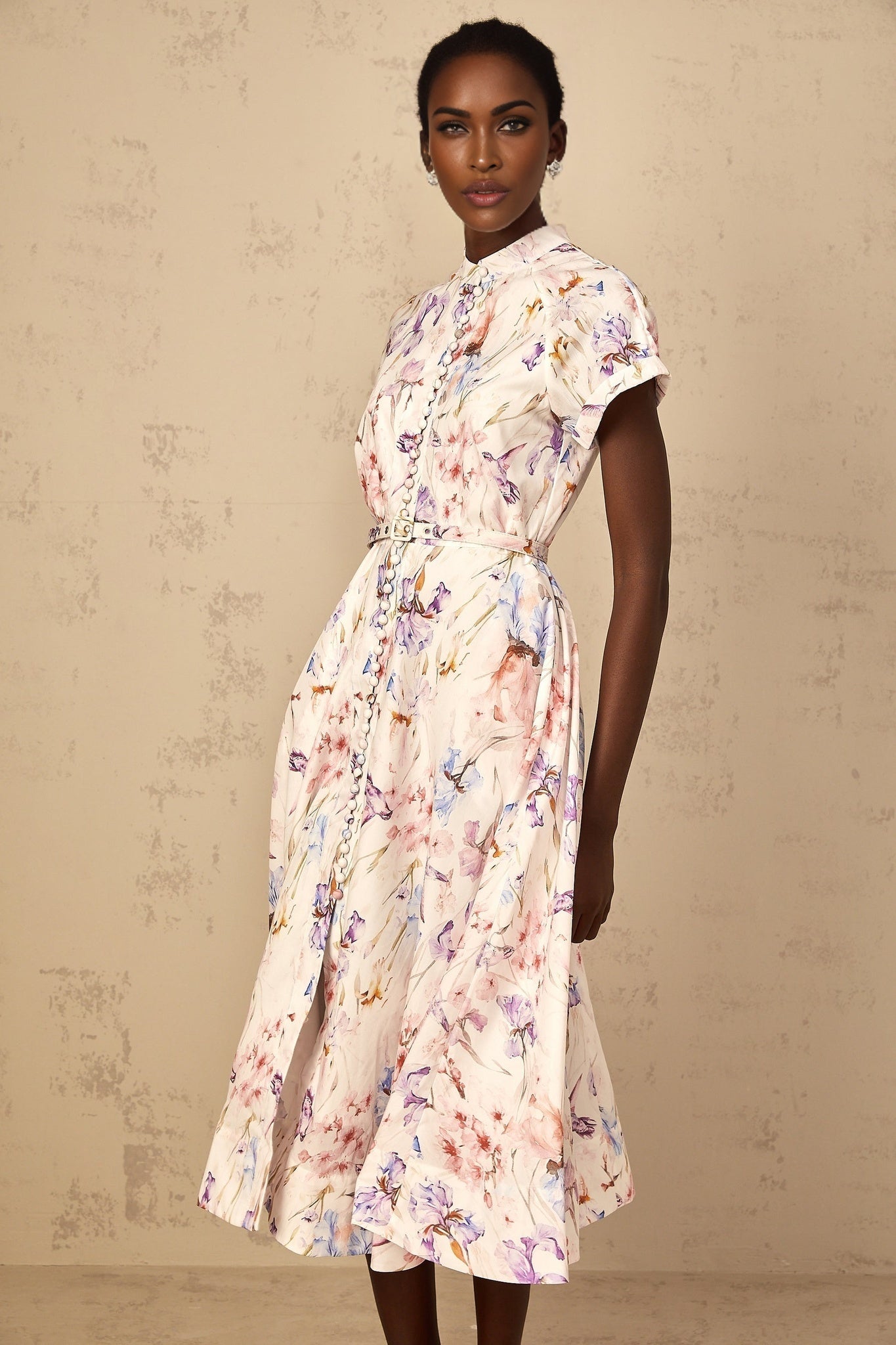 A white floral print midi dress with a mock neck design for women featuring a Geraldine style