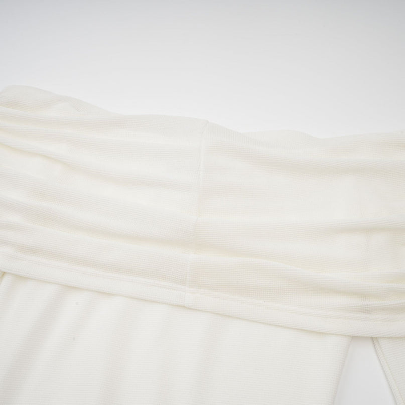 A white knit maxi dress with glittered floral appliques named Wanda