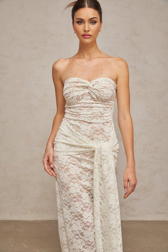 A white lace midi dress with draped detailing named Wilhelmine