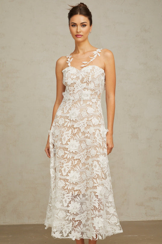 A white lace midi dress with tulle panels named Carole featuring a delicate and feminine design