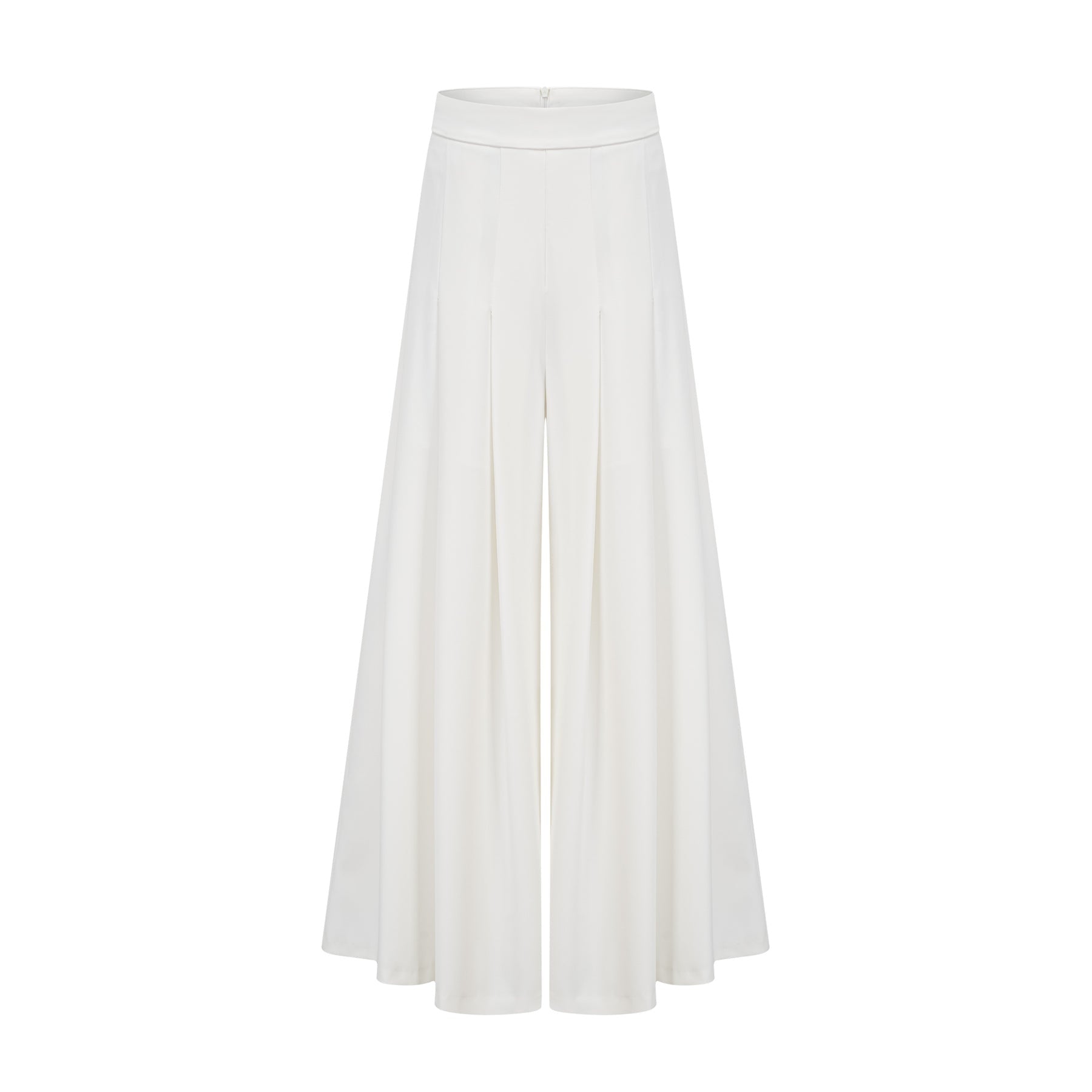 A white matching set featuring a creased top and trousers worn by a model standing against a plain background