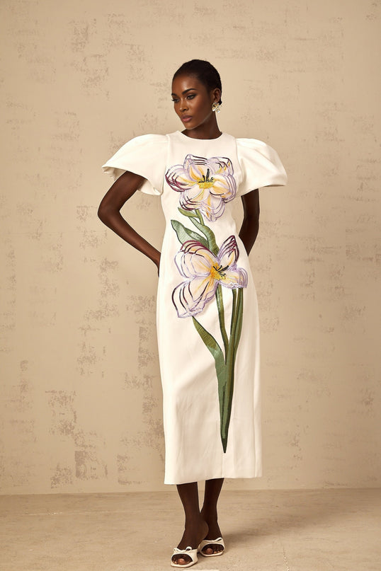 A white midi dress for women featuring sequin floral embroidery details covering the bodice and skirt