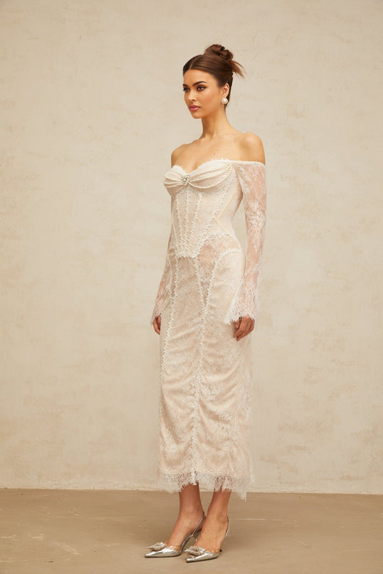 A white midi dress with embellished floral lace pattern named Enora