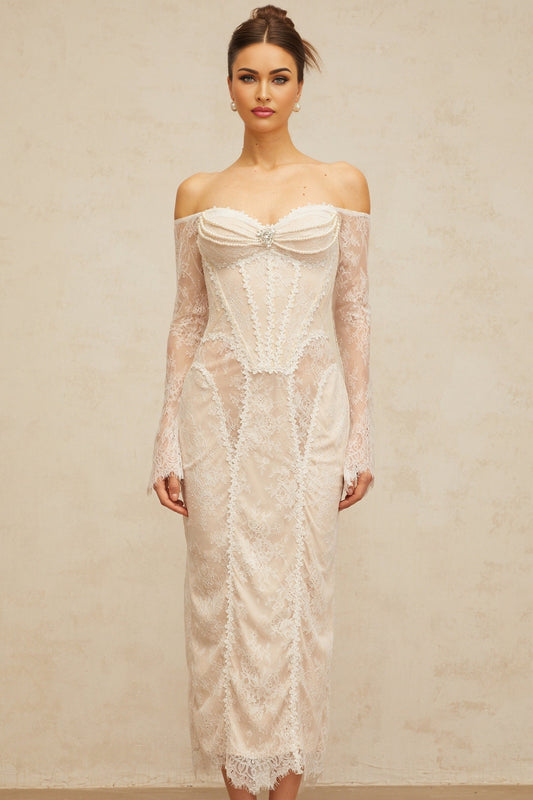 A white midi dress with floral lace embellishments named Enora