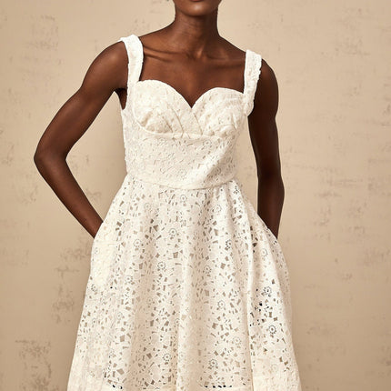 A white midi dress with floral lace pattern Nicolette style featuring delicate details and a feminine silhouette