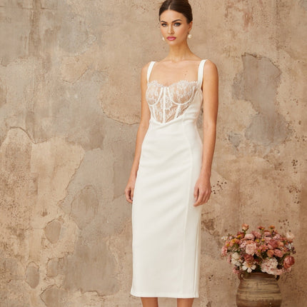 A white midi dress with lace panel details and a corsetstyle bodice