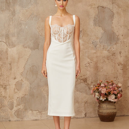 A white midi dress with lace panels and a corsetstyle bodice
