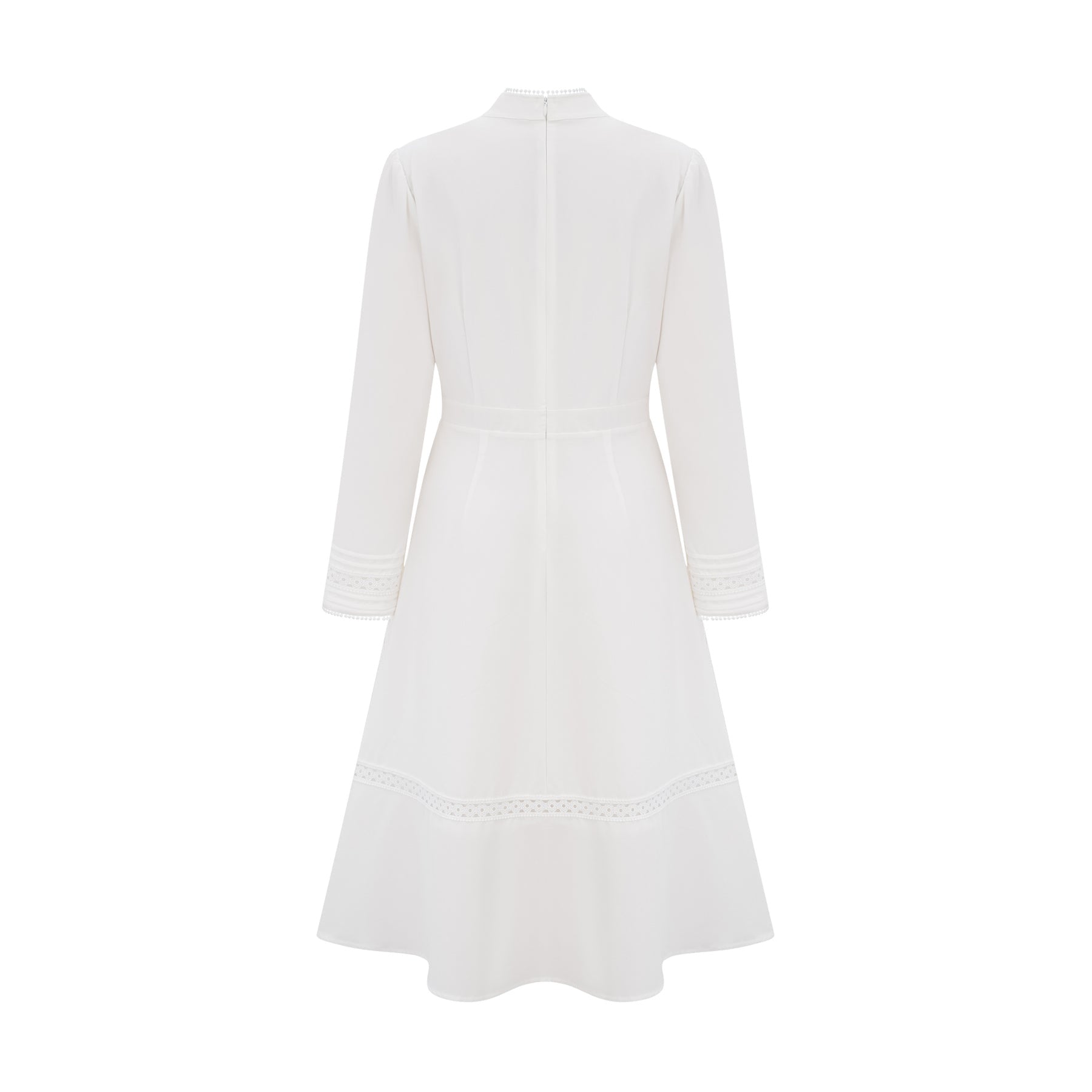 A white midi dress with panelled design and embroidery details named Madeleine featuring a feminine silhouette and delicate stitching throughout