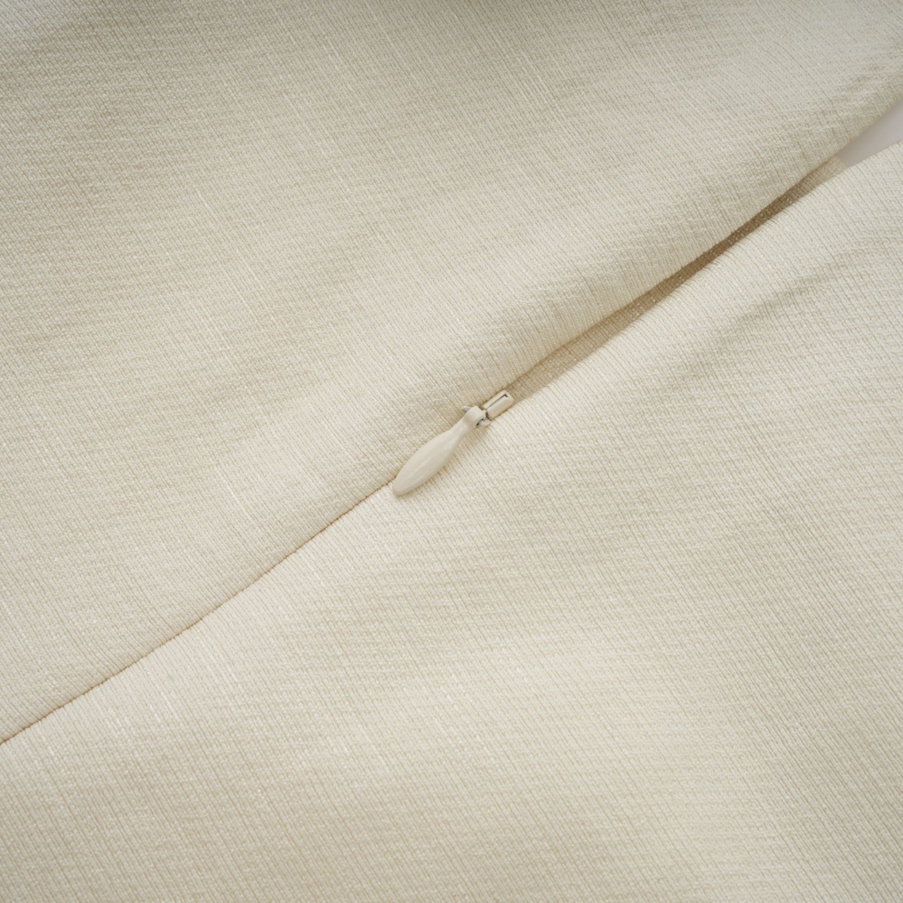 A white midi dress with tulle panels and a bow detail named Therese