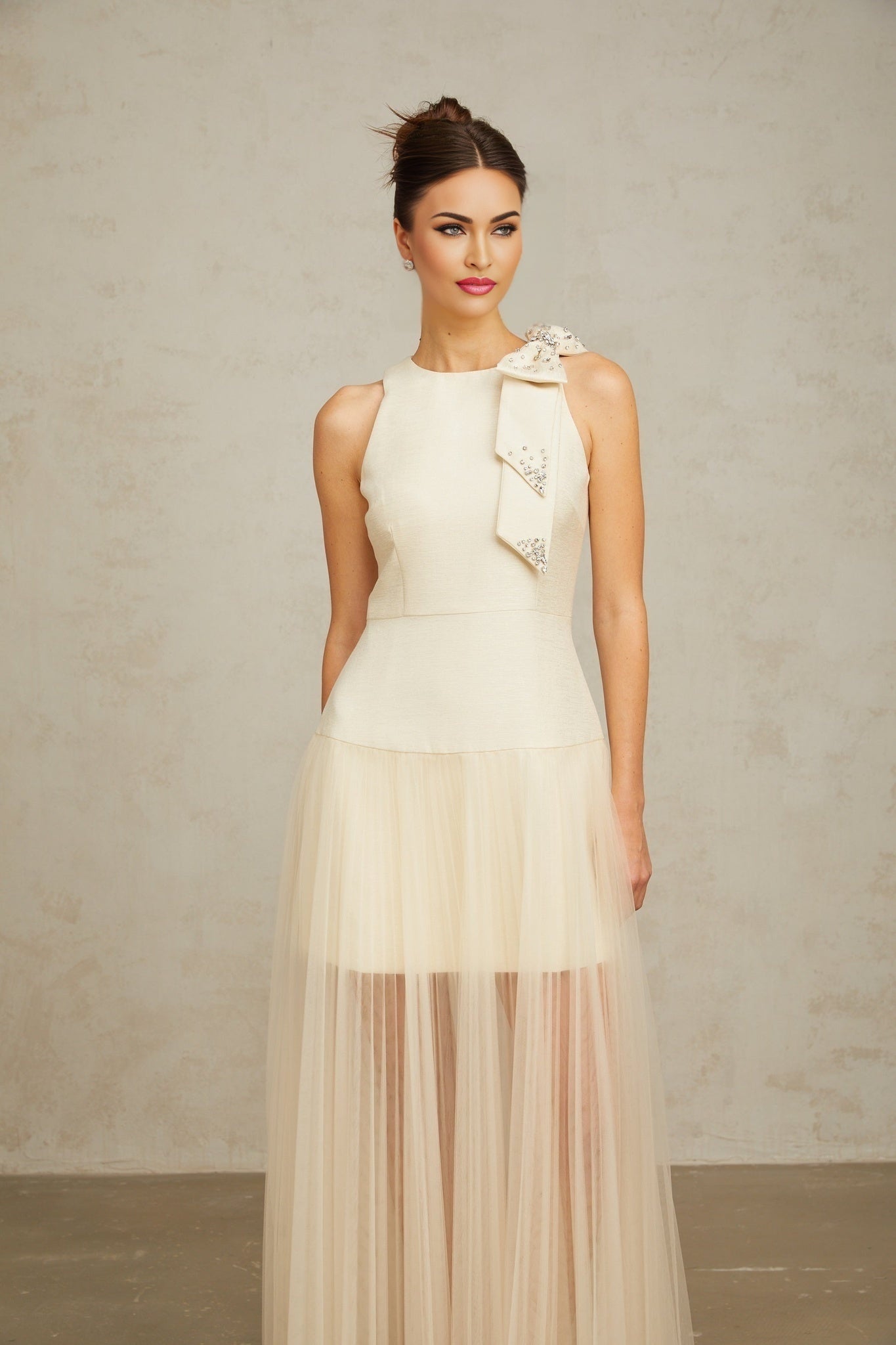 A white midi dress with tulle panels and a bowknot detail named Therese