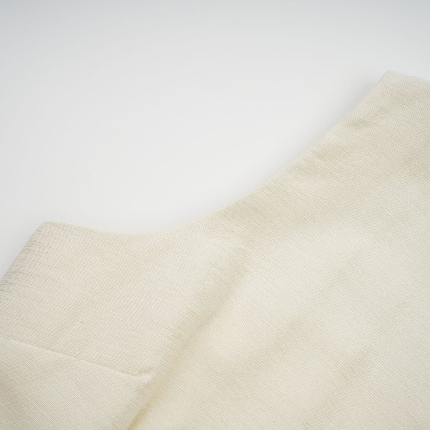 A white midi dress with tulle panels and a bowknot detail named Therese
