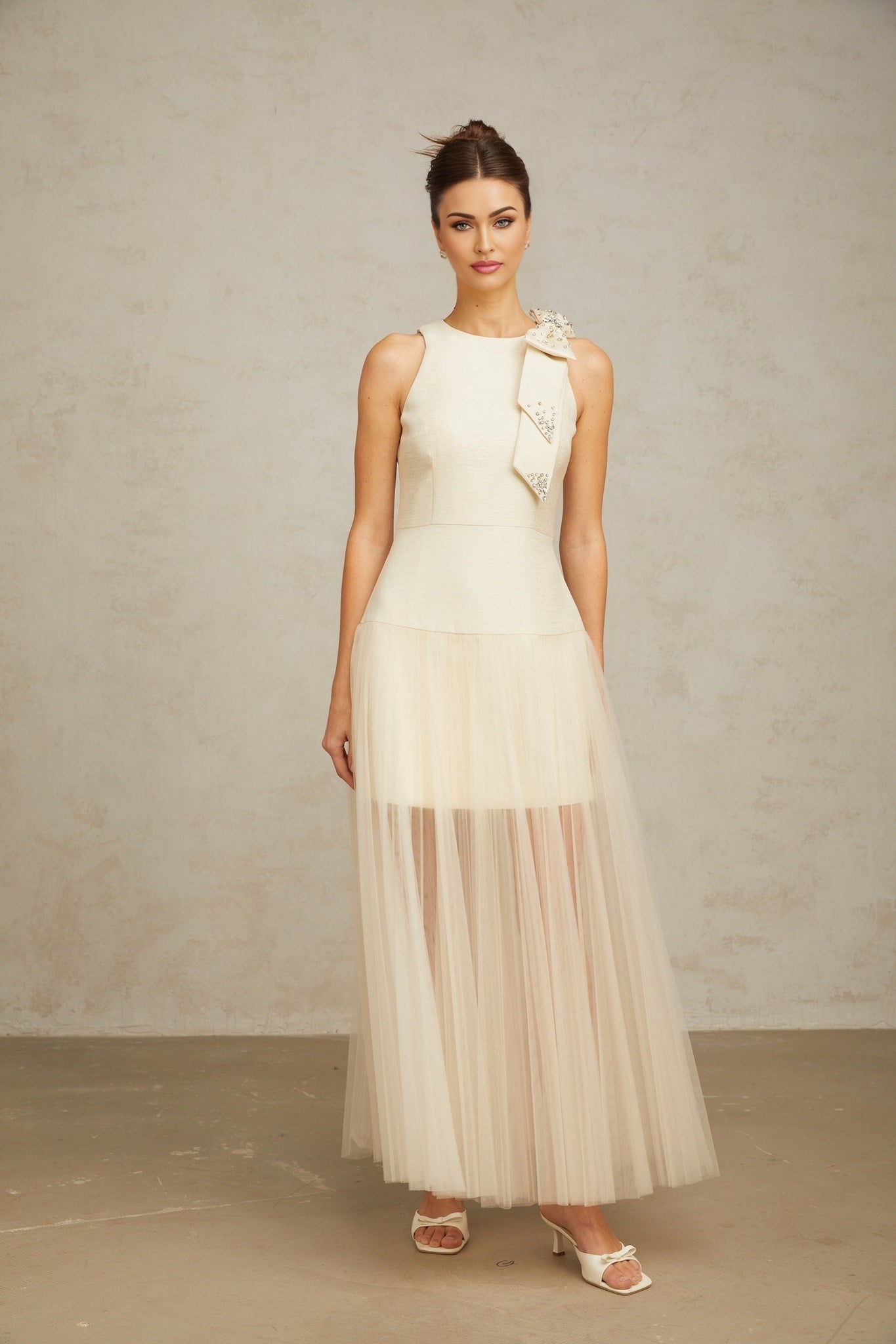A white midi dress with tulle panels and a bowknot detail named Therese