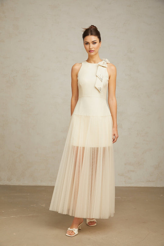 A white midi dress with tulle panels and a decorative bowknot detail named Therese
