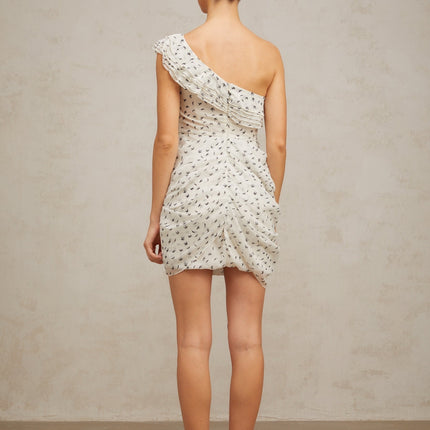 A white mini dress with a pattern print and ruffled details named Irina