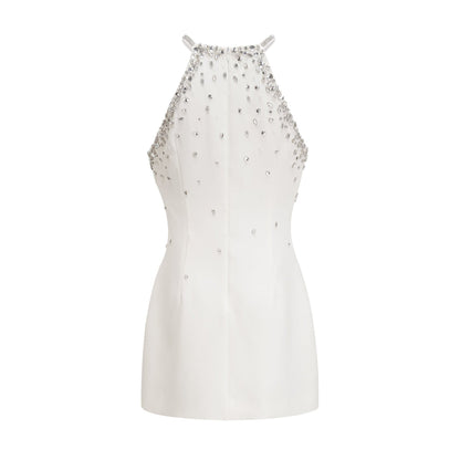 A white mini dress with embellishments named Xanthea featuring a short hemline and decorative detailing