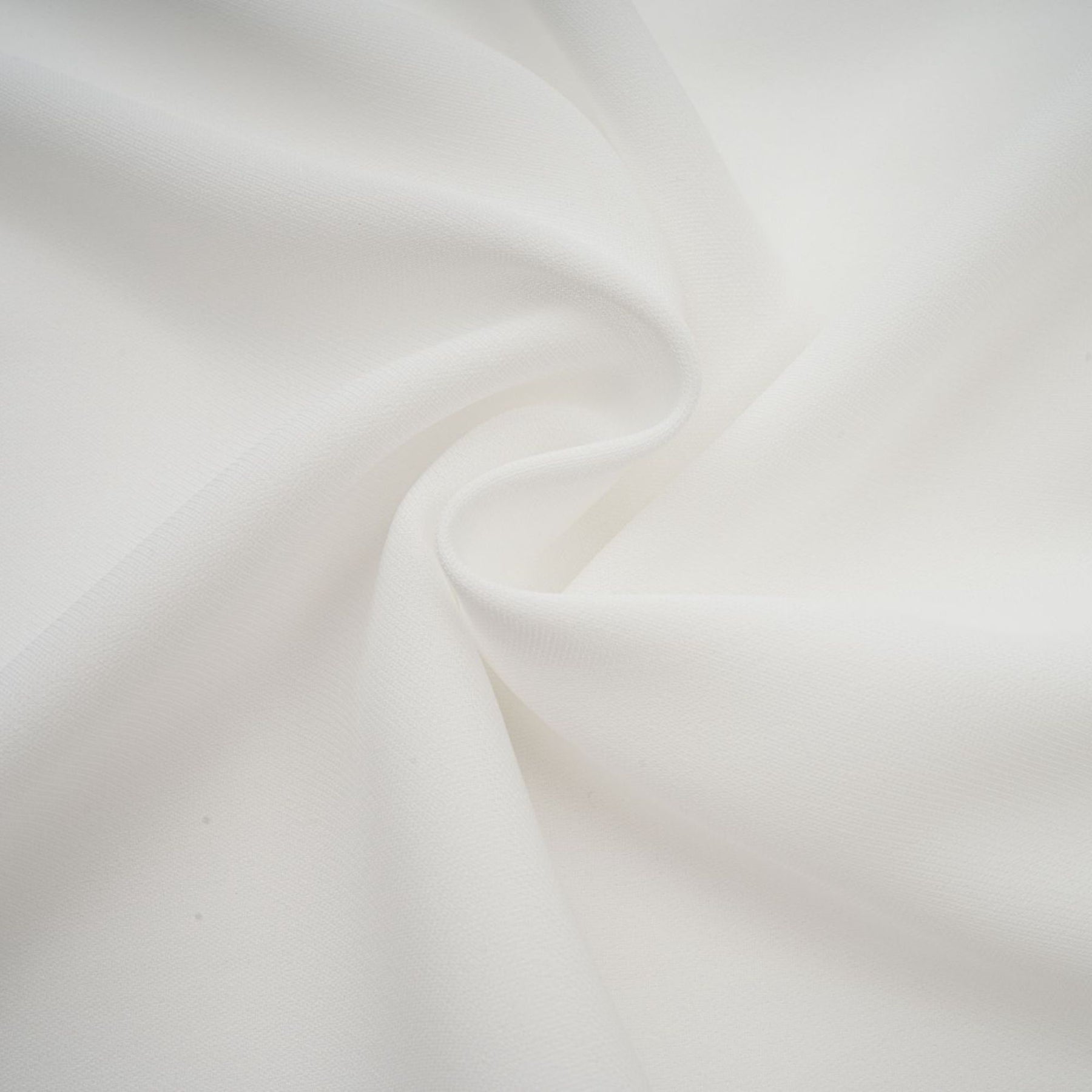 A white mini dress with ruched fabric and ribbon design details featuring a short length and fitted silhouette