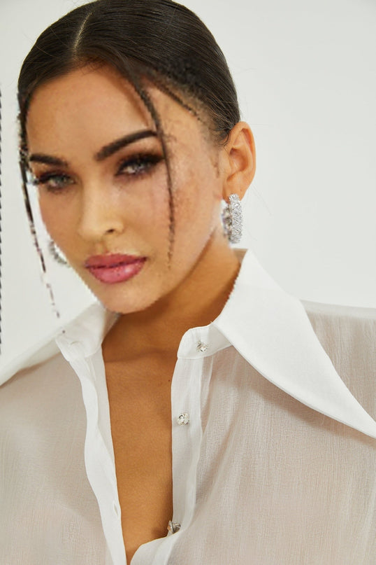 A white mini shirt dress with ruffles named Renee