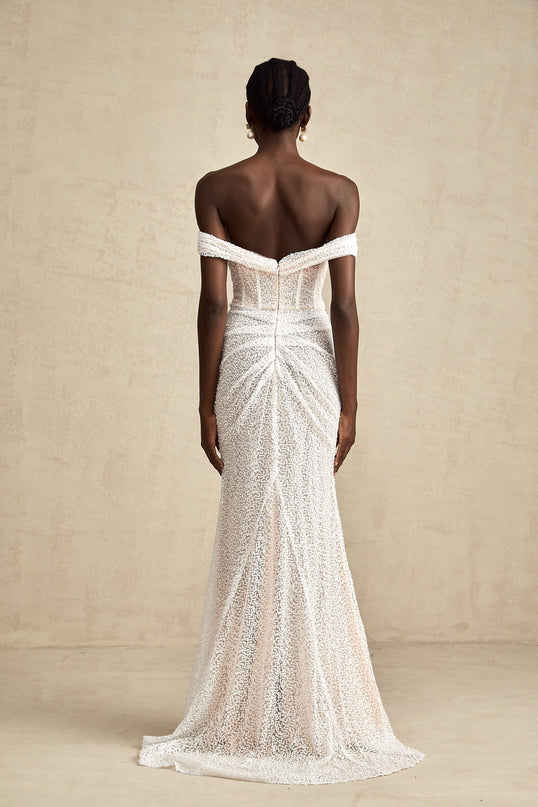 A white offshoulder maxi dress with embellishments named Margot