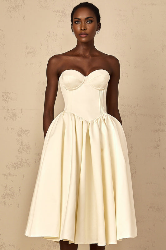 A white offshoulder midi dress for women with shirred detailing featuring a fitted bodice and flowy skirt