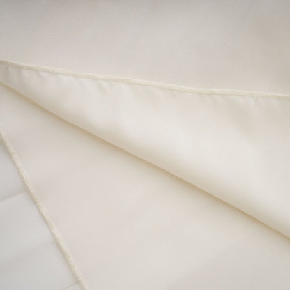 A white pleated jacket and matching dress set with embellishments The jacket features a tailored design while the dress has a sleek silhouette Both pieces are adorned with decorative details creating an elegant ensemble suitable for formal occasions